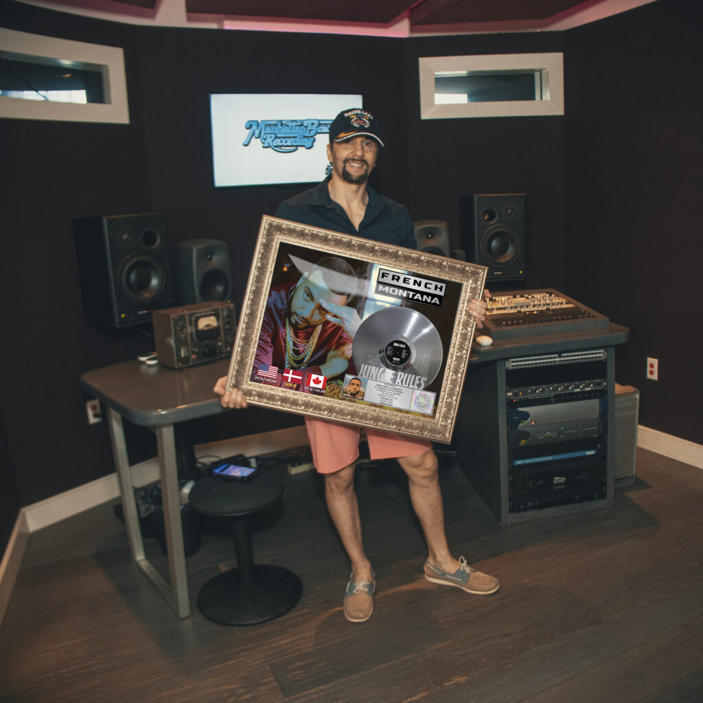 Masar receives an RIAA Platinum Record Award for  his contribution to French Montana’s album  “Jungle Rules”